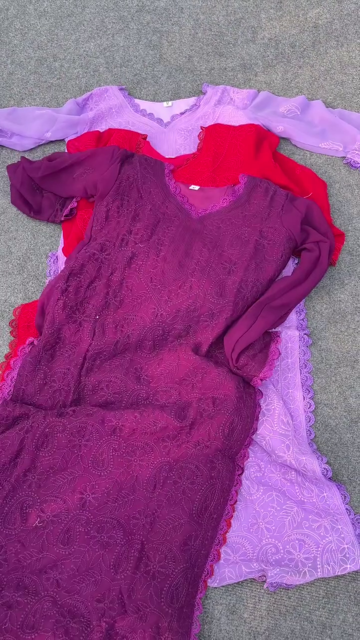 woman heavy chikankari kurti
